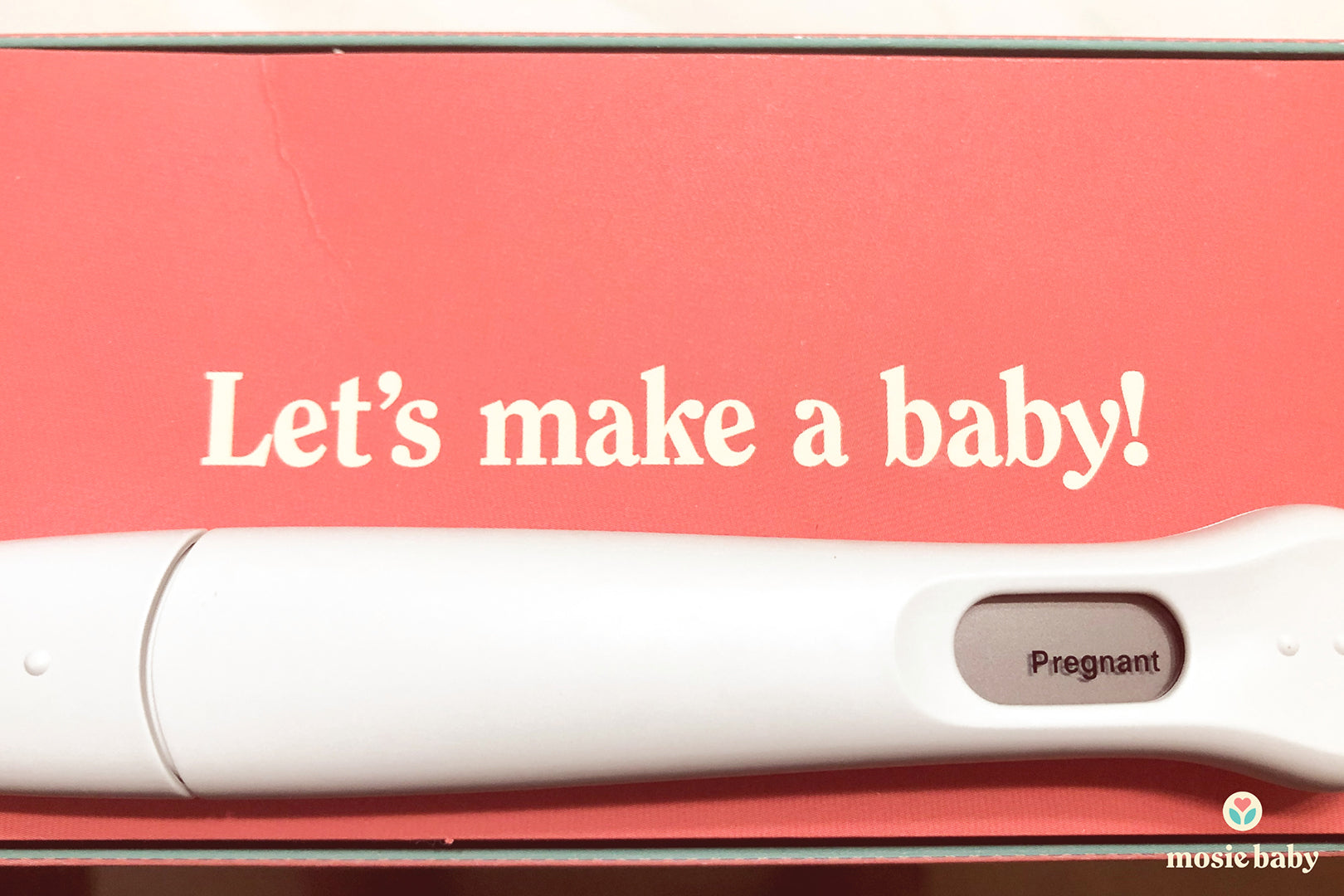 positive pregnancy test with the mosie baby box