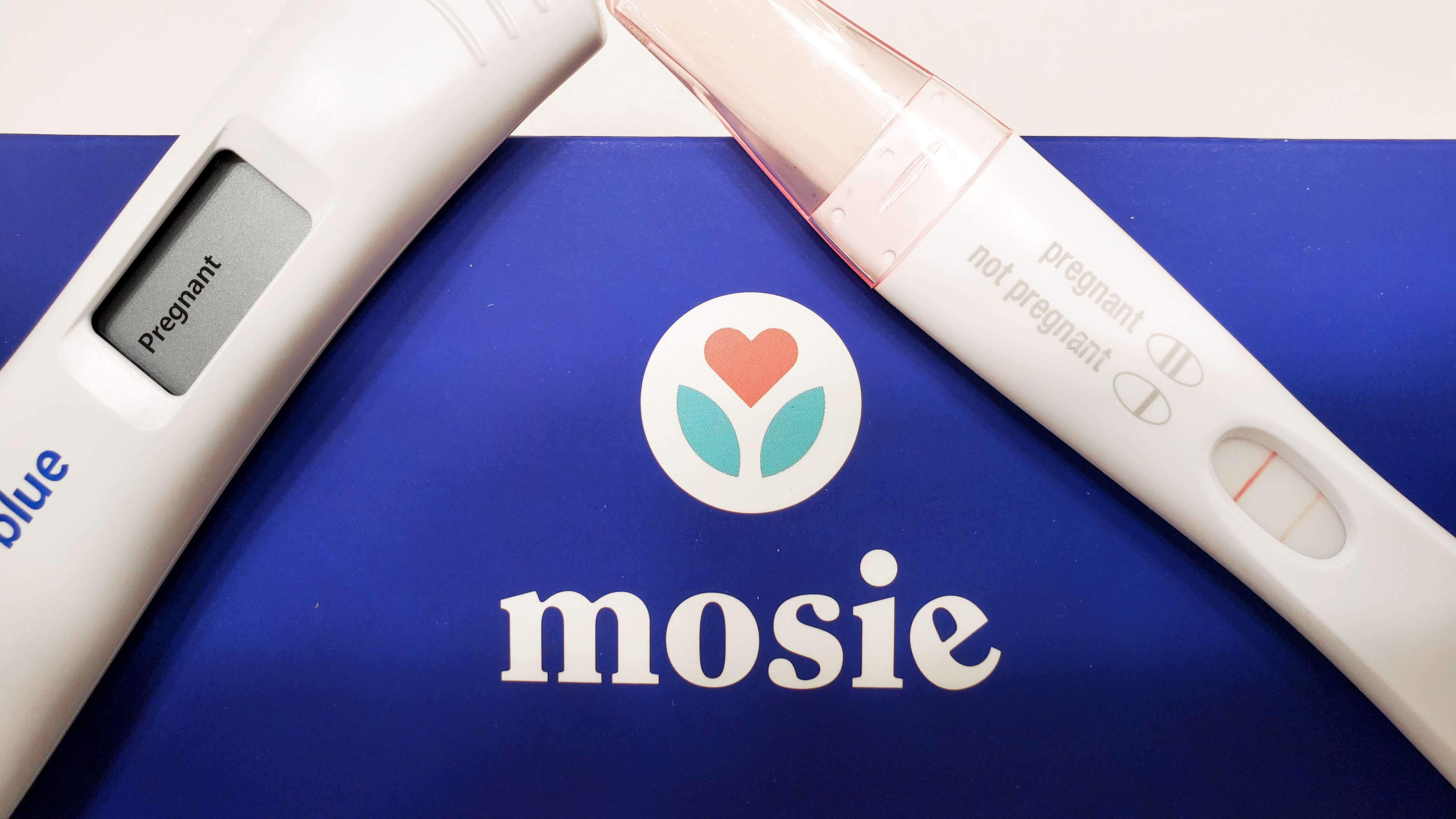 Mosie Kit Box with 2 positive pregnancy tests
