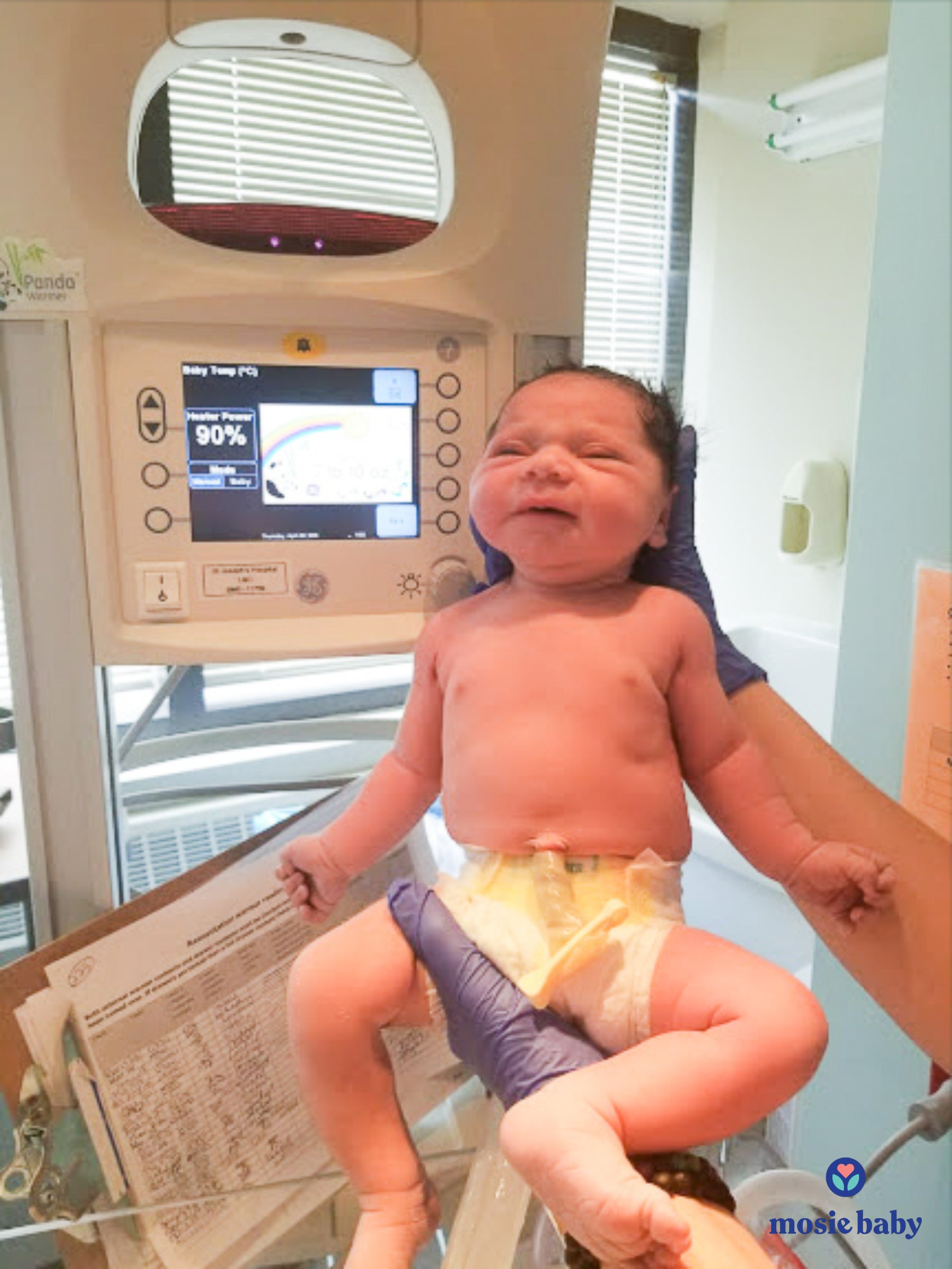 newborn mosie baby in the hospital just after birth