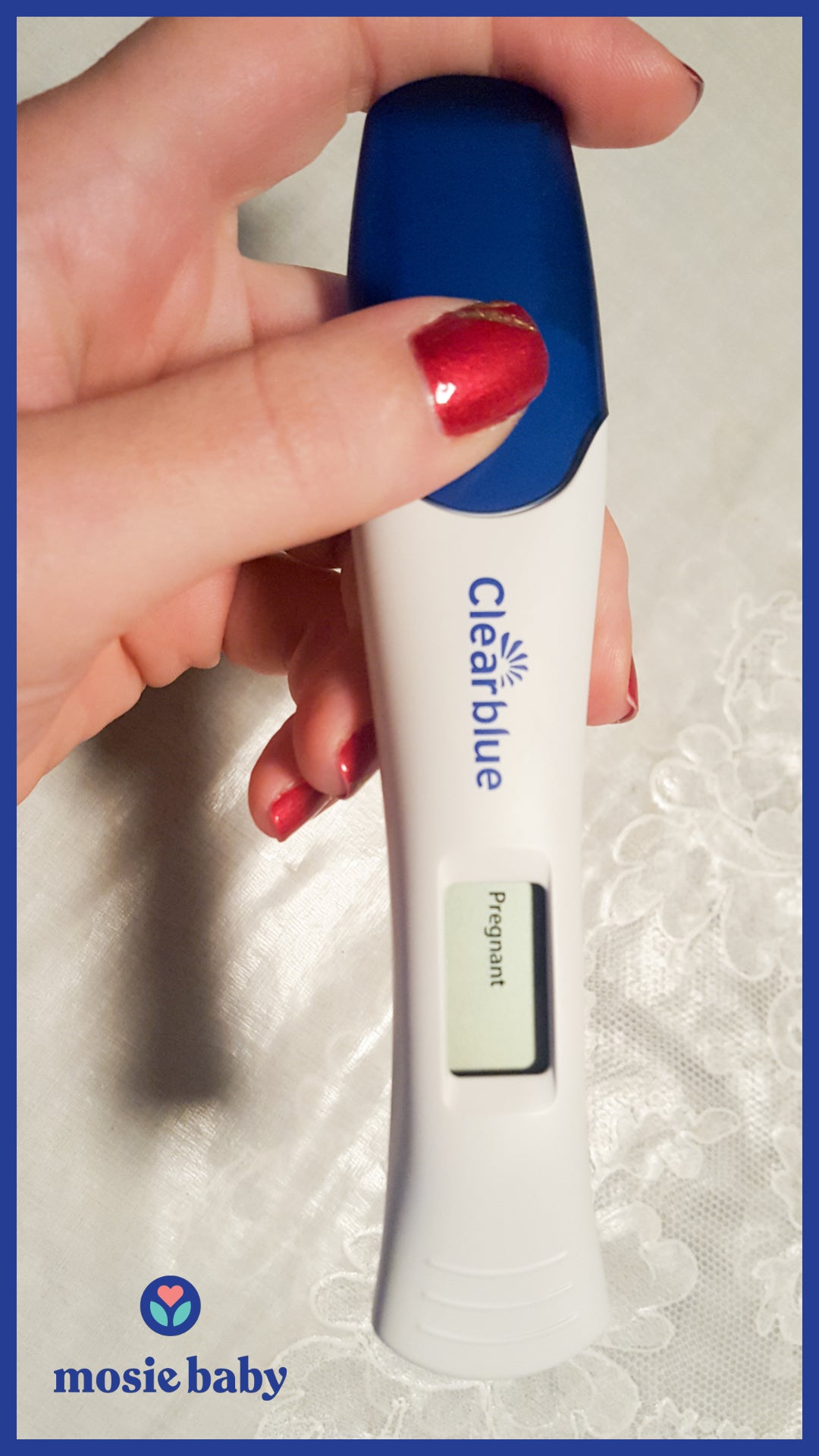 positive pregnancy test held by a Mosie user