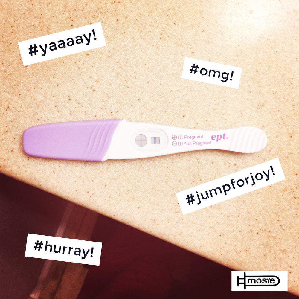 positive pregnancy test of a Mosie user with hashtags around it reading #omg and #hurray