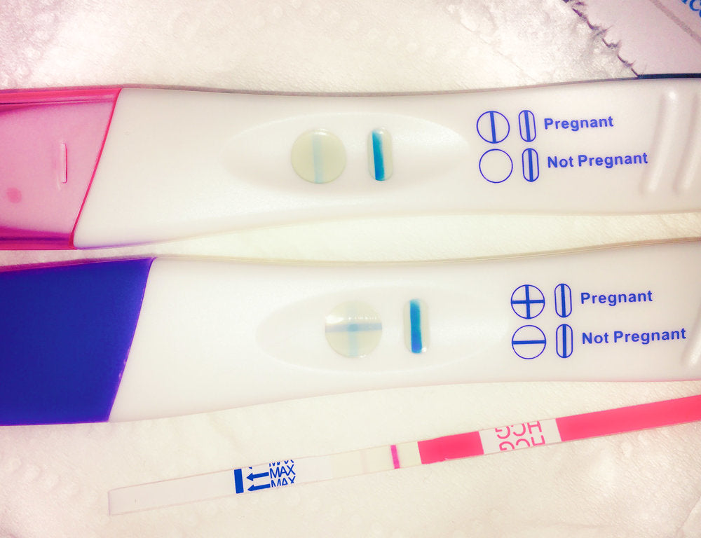 three positive pregnancy tests from a Mosie user